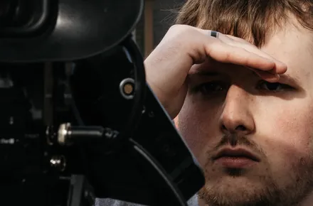 Kian framing a shot behind a cinema camera